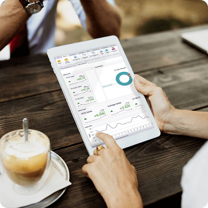A business women hand on tablet with AI generated reports of F5 Sales Tracker retail displayed on it.